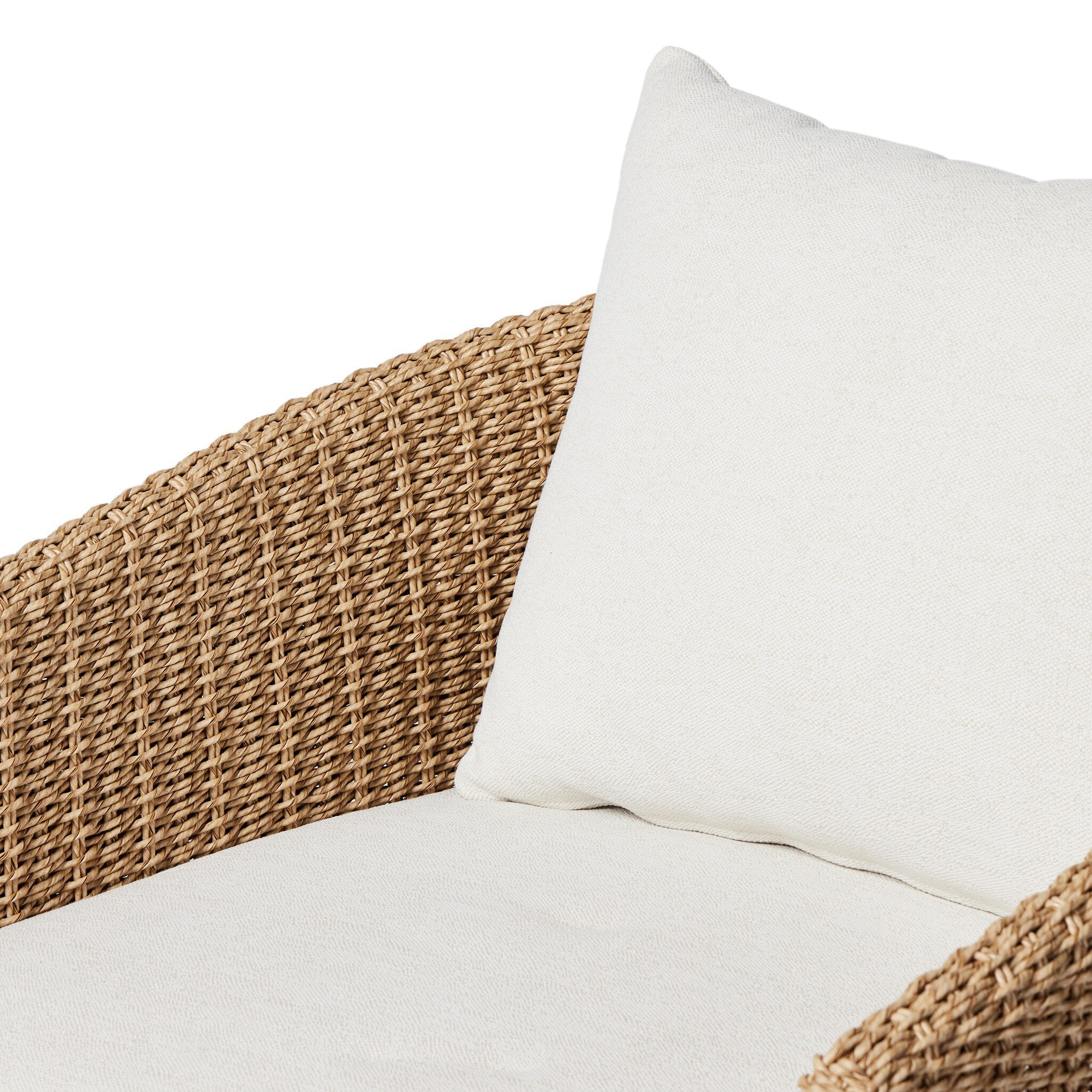 Cushion detailing Maven Outdoor Swivel Chair in Alessi Linen with a faux hyacinth woven shell and 360-degree base