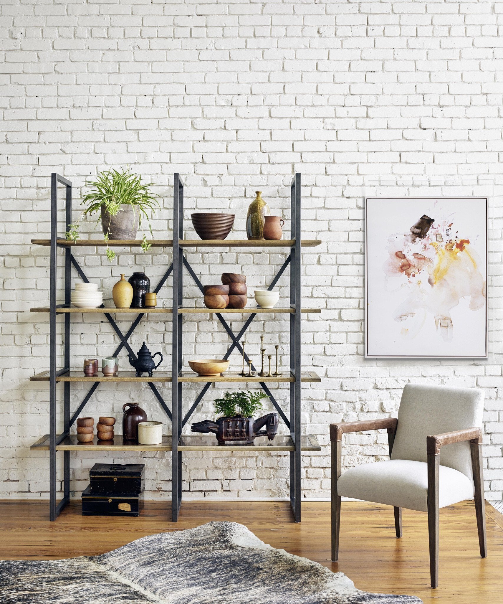 Decorative scene Reuben Dining Chair with oak frame, leather-wrapped arms, and natural linen seat