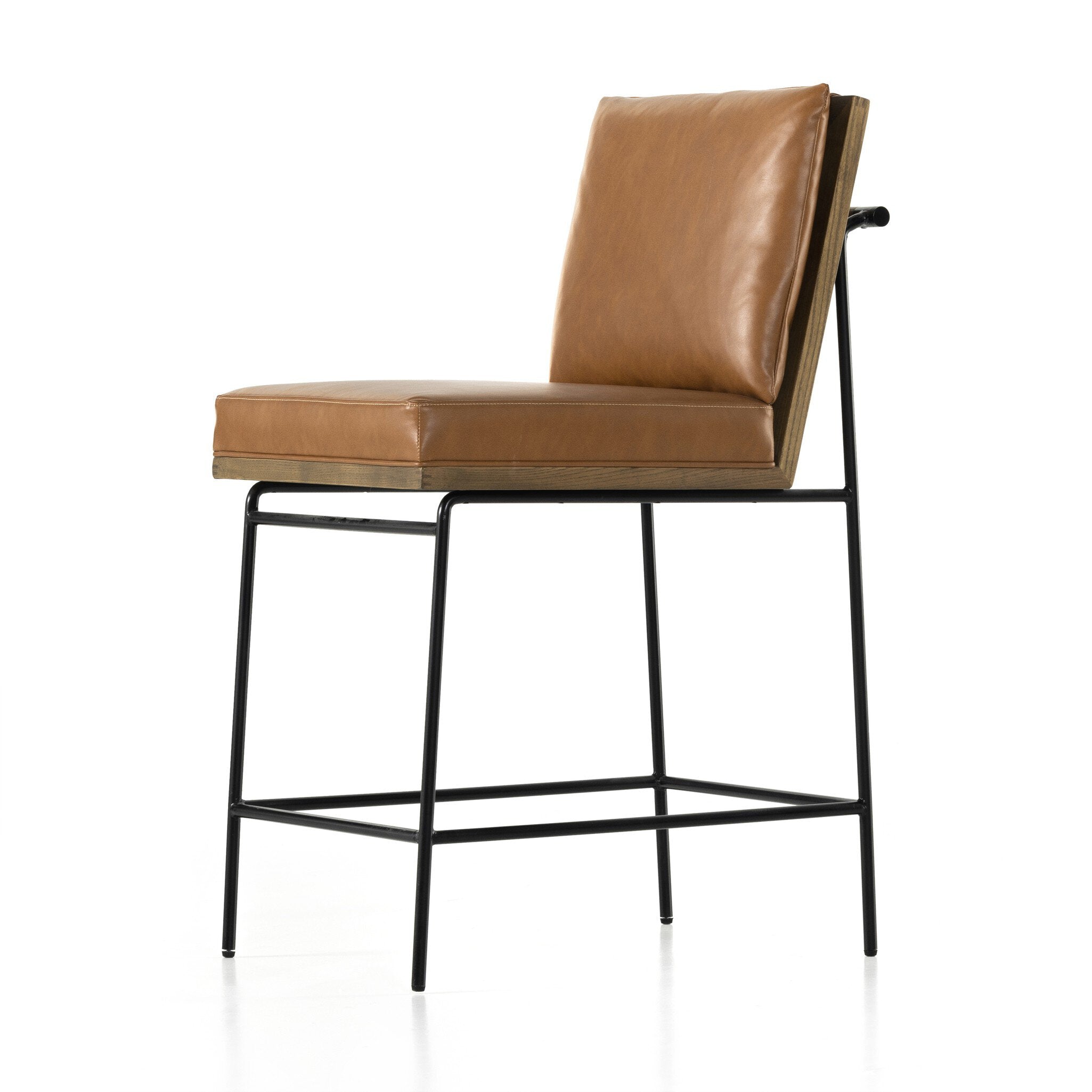 Counter stool with tan leather-look seat and tall back, black metal frame and footrest