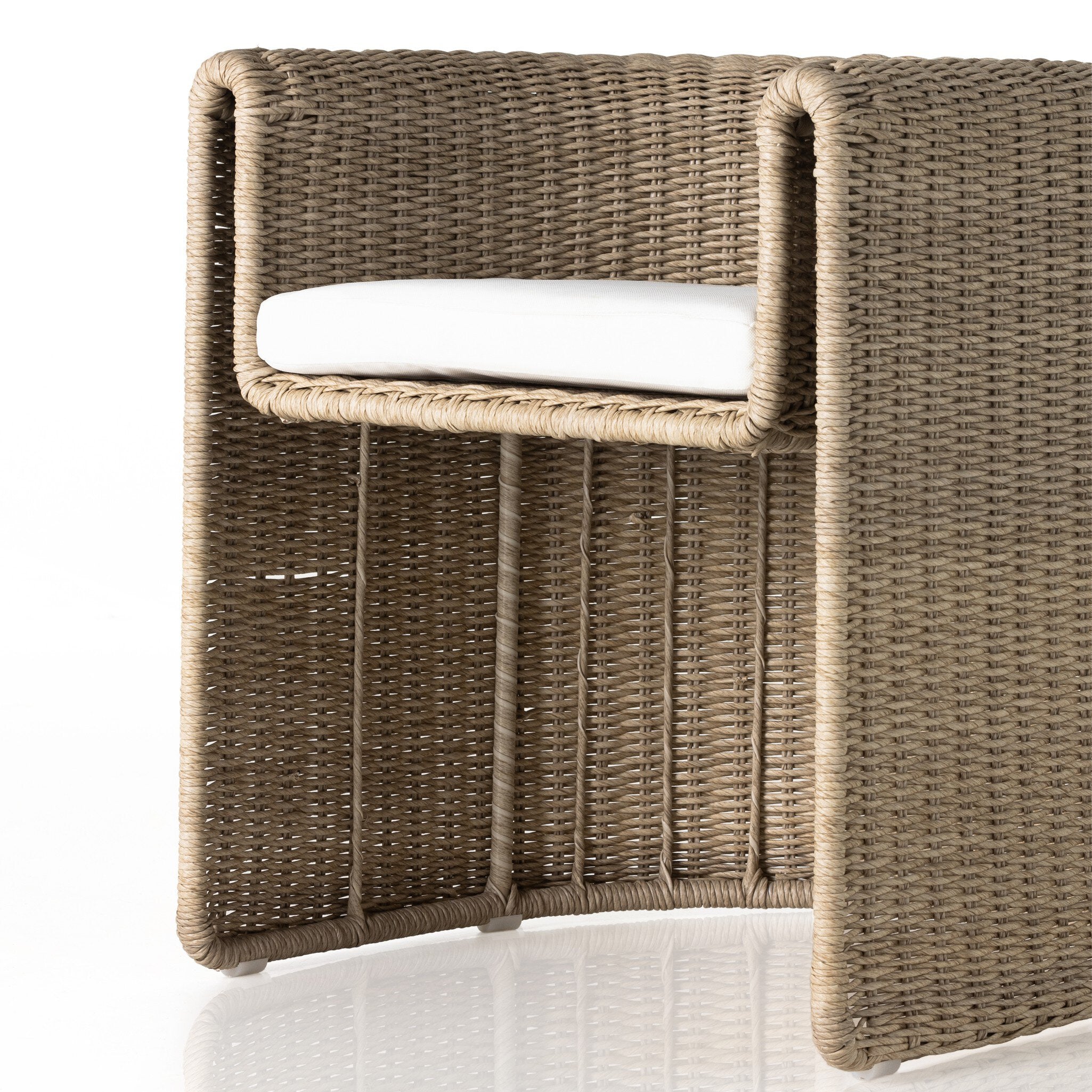 Detail Tucson Outdoor Dining Chair with woven wicker frame and Stinson White cushions