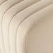 Close-up Custom Augustine dining banquette in neutral performance fabric with high-back tufted detailing and wood base.