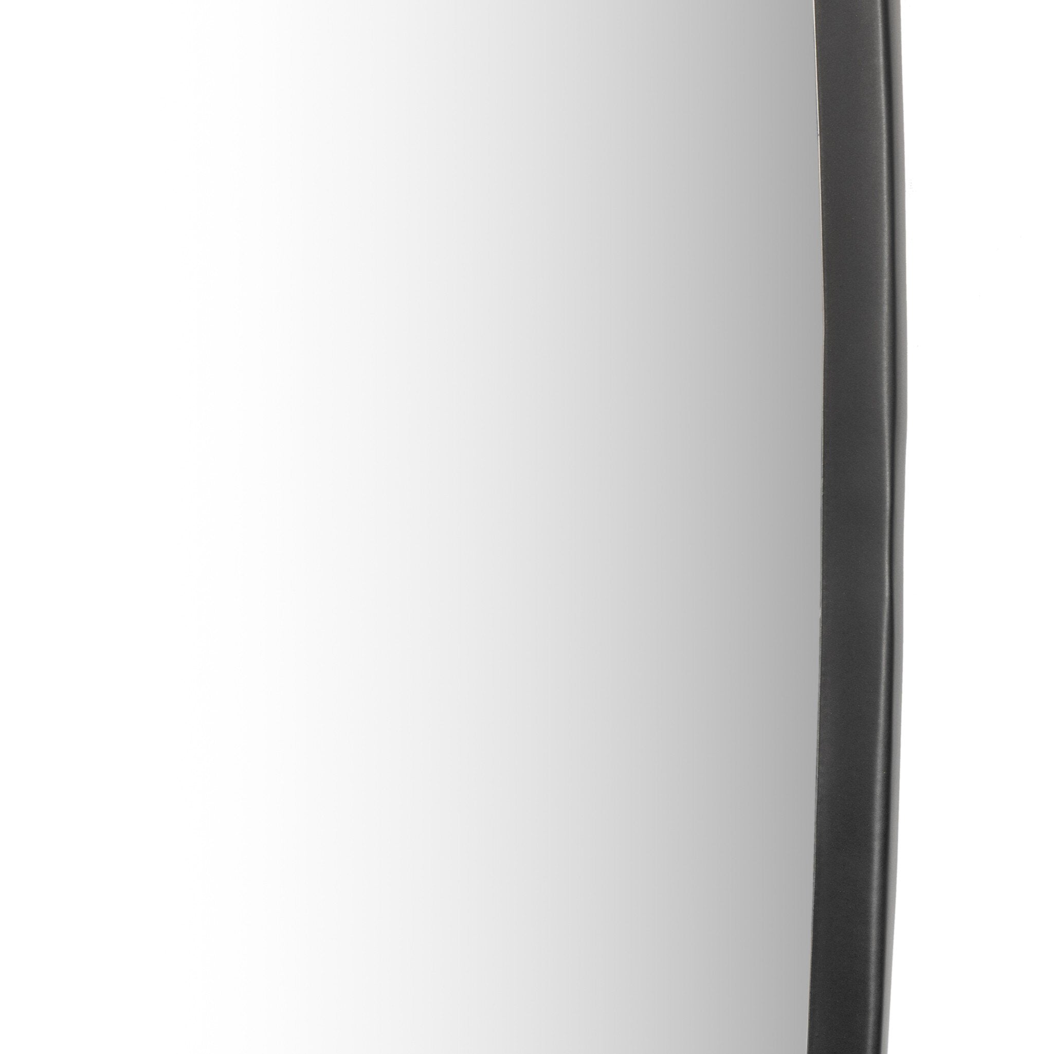 Detailed Close-up of the Brinley mirror's unique organic shape and mixed metal frame texture