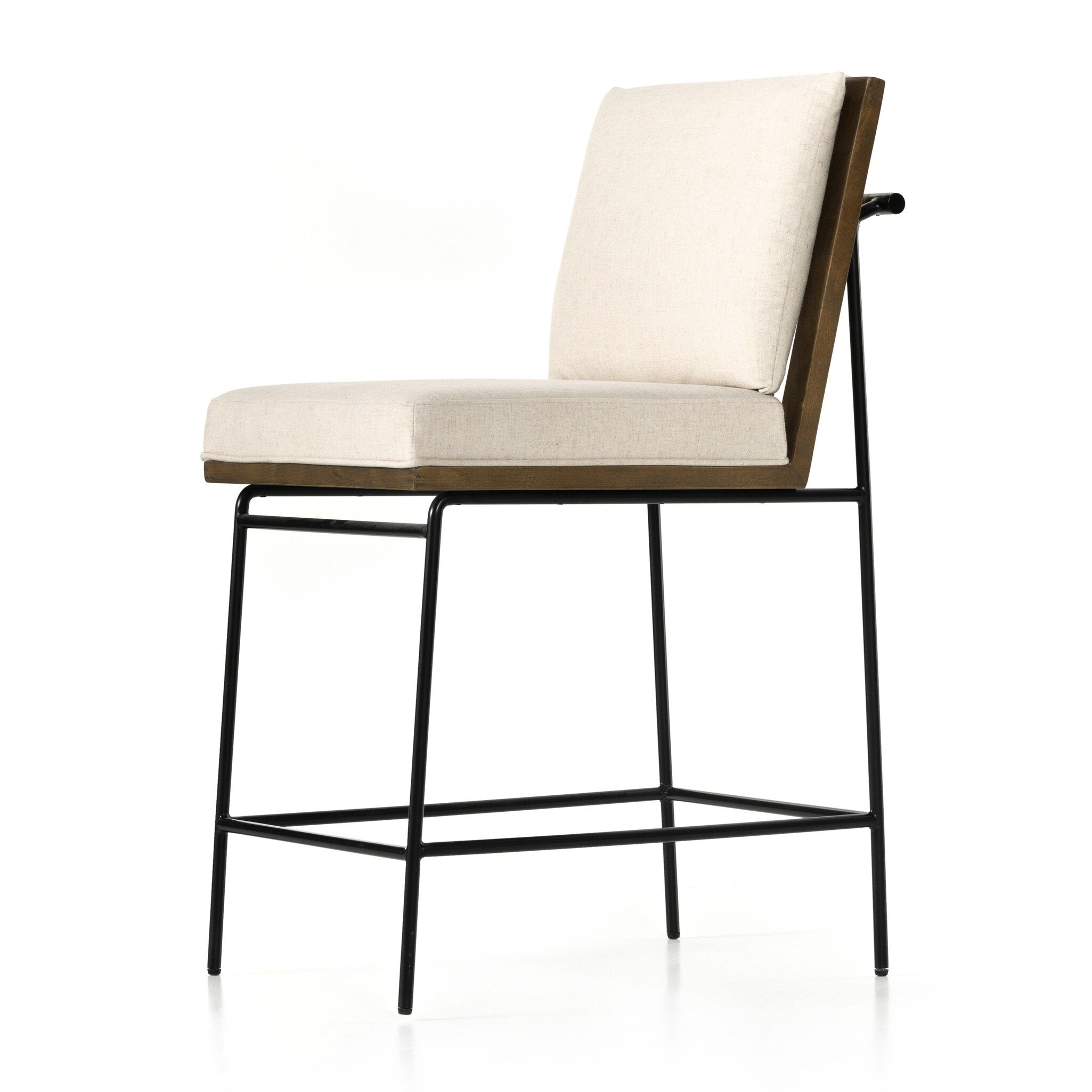 Counter stool with cream seat cushion and tall backrest, black metal frame and wood armrests