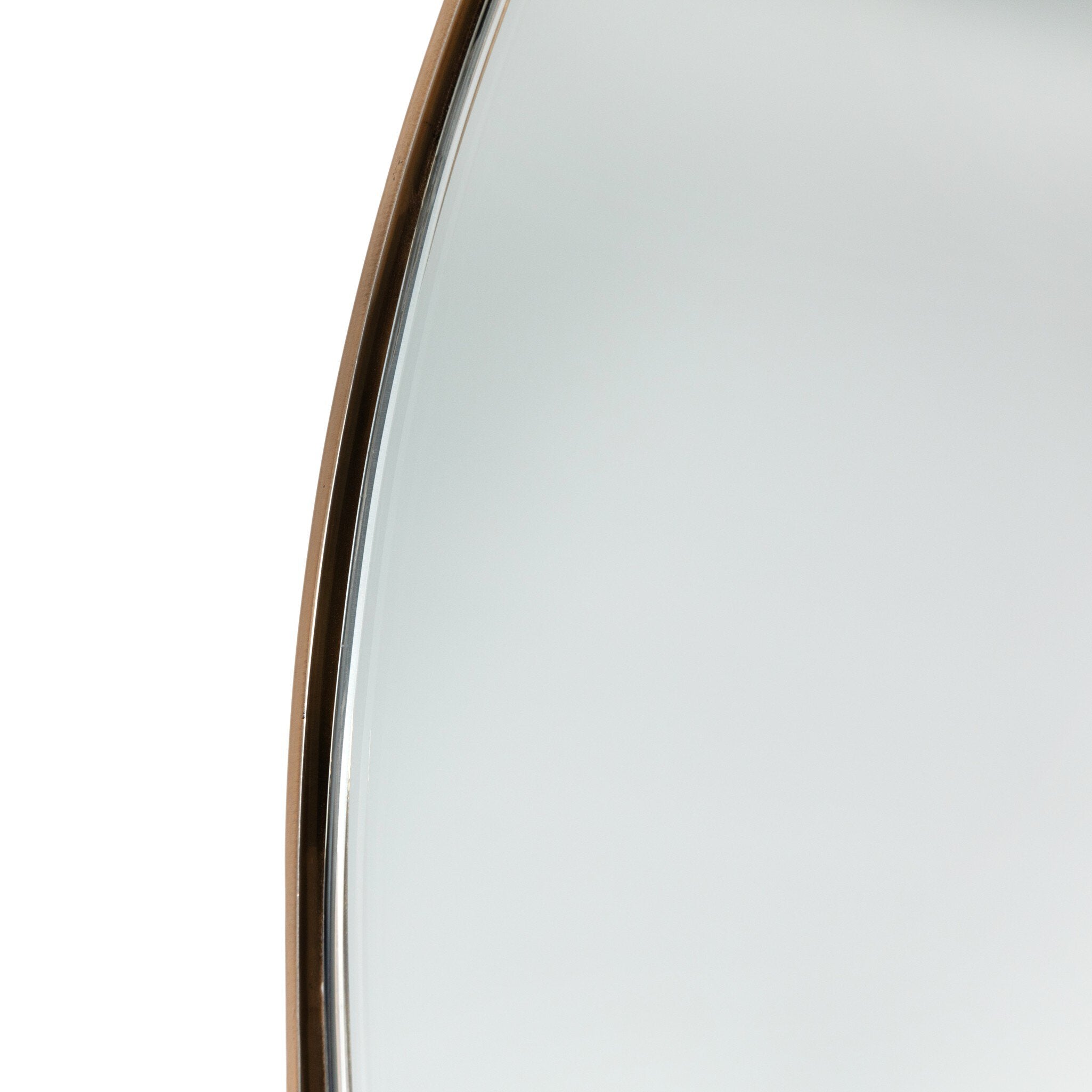Detailed close-up of the Georgina Small Mirror showing the hand-applied polished brass aluminum frame and clean arched top.