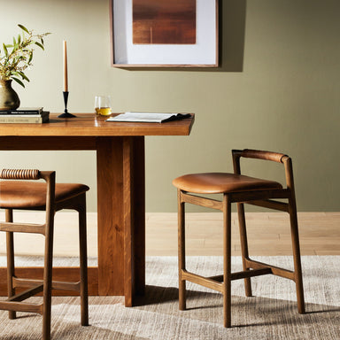 Dining scene Baden Counter Stool in Haven Tobacco top-grain leather with a minimalist black frame