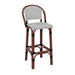 Bar stool with dark wood frame and white woven seat and back with black speckles
