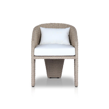 Fae Outdoor Dining Chair with a barrel back, three-leg base, and Stinson White Olefin cushions
