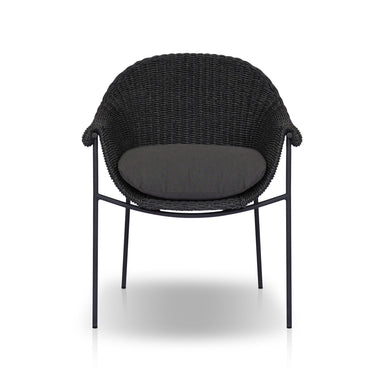 Suerte black wicker outdoor dining chair in arashi ink with faux hyacinth weave and iron base on a white background