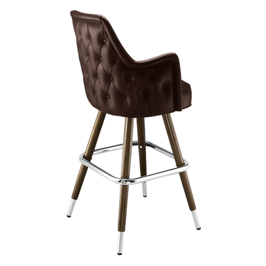 Dark brown tufted high-back bar stool with brass wood legs and chrome footrest