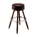 Brown upholstered bar stool with round seat, chrome footrest, turned wooden legs