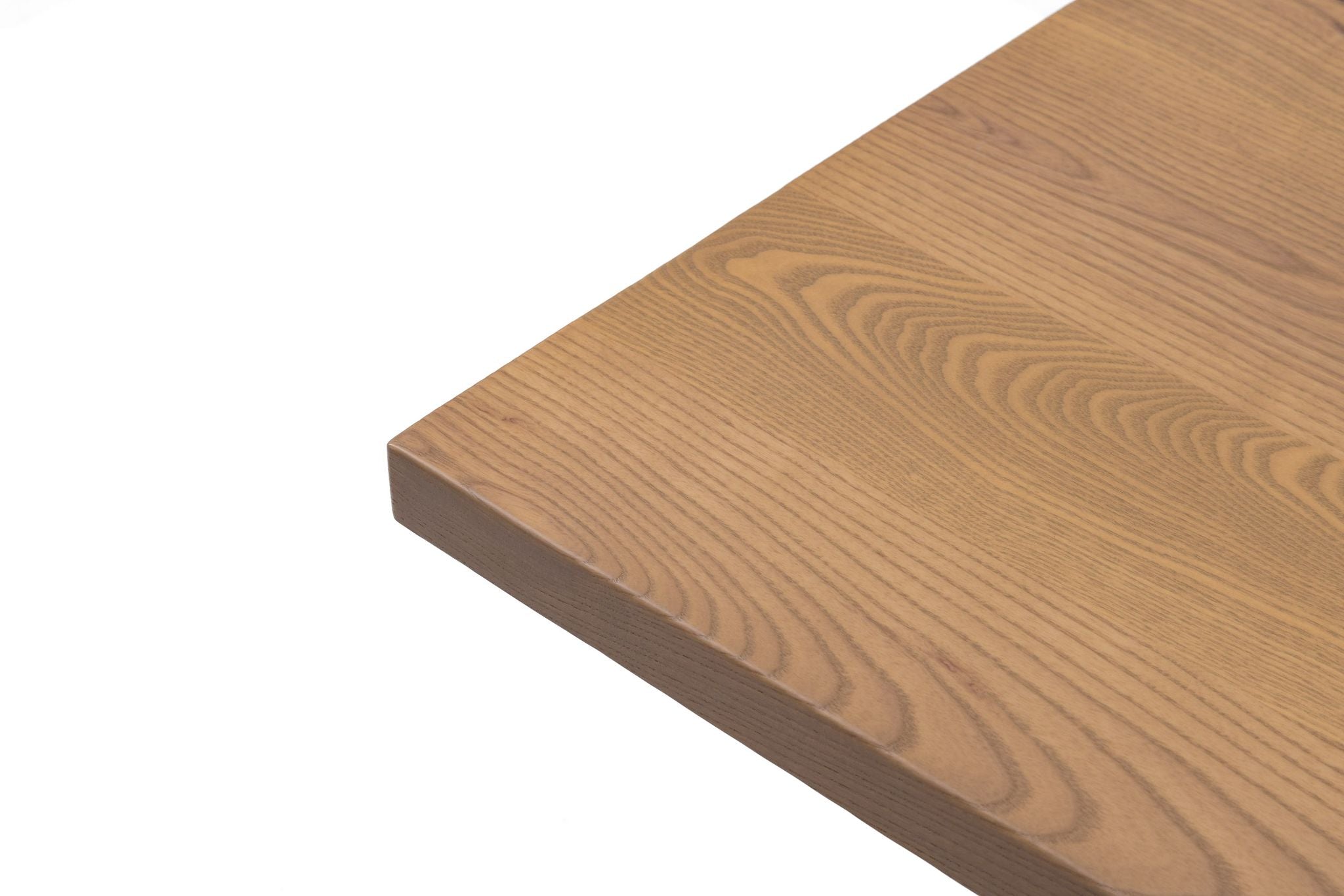 Close-up of ash table top edge showing natural wood grain and smooth surface