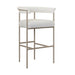Upholstered bar stool with light fabric seat and rounded back, taupe metal frame.