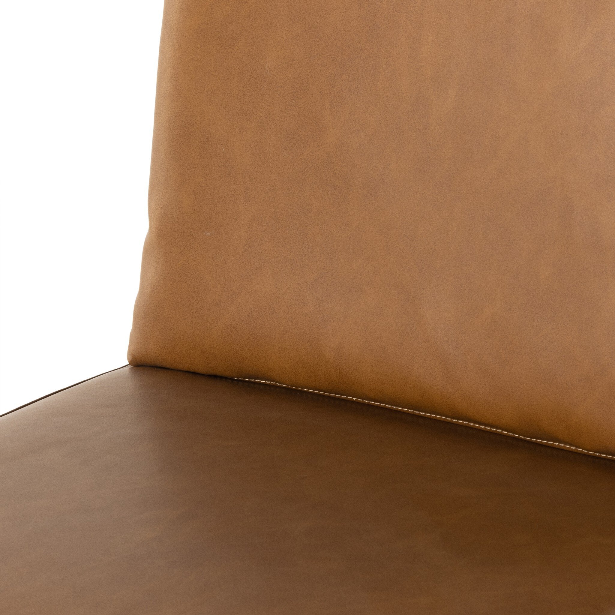 Crete bar stool upholstery close-up in medium brown tan with stitched seam