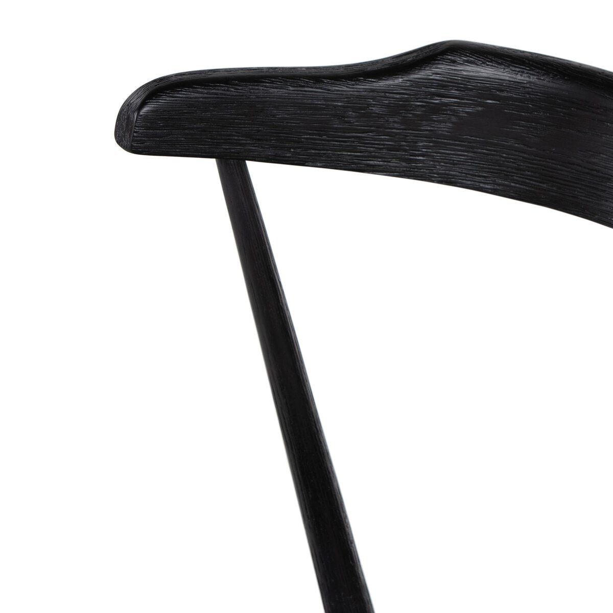 Black oak counter stool backrest detail with smooth rounded edge, dark woodgrain close-up