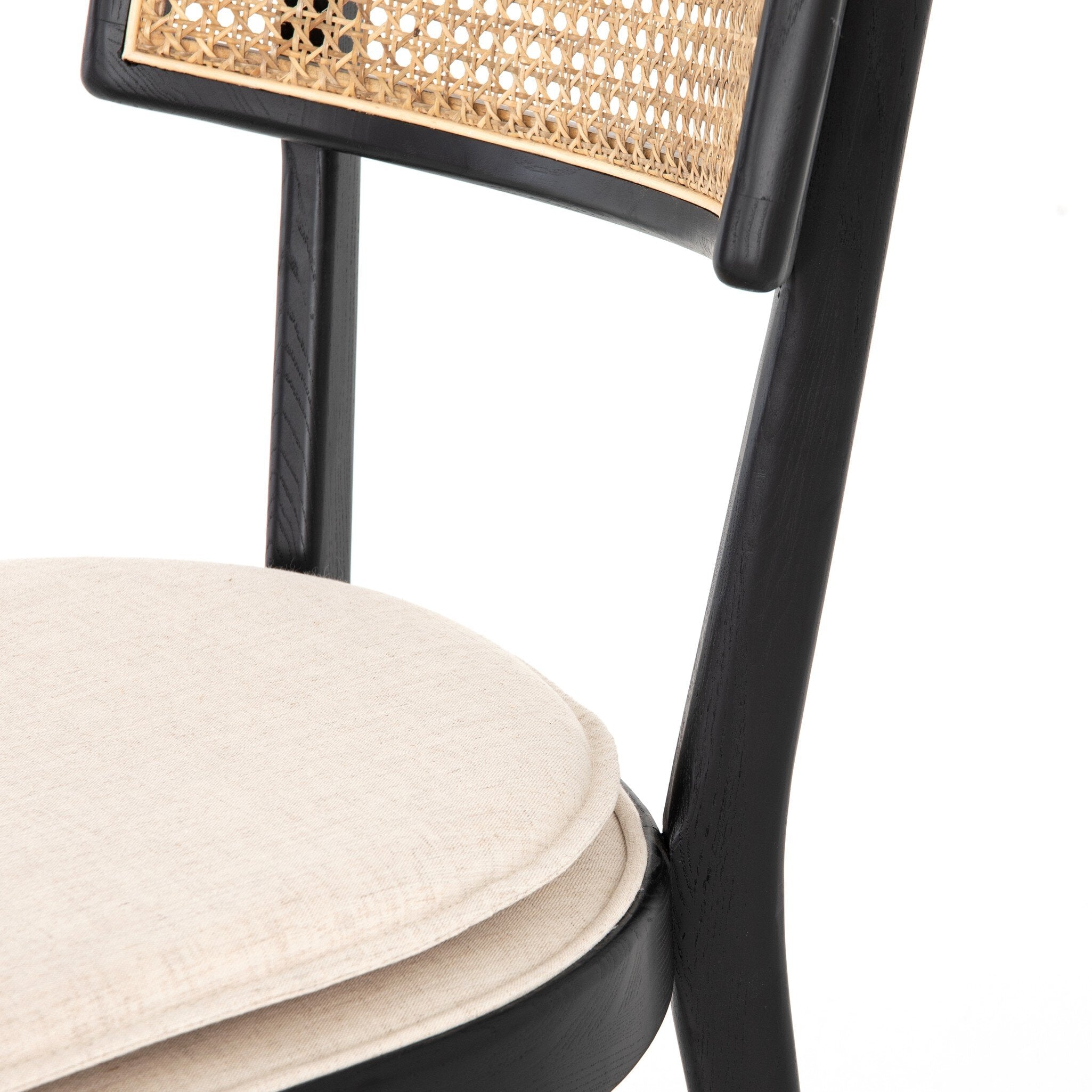 Inner Detail Britt Dining Chair in Cambric Ivory performance fabric with black parawood tapered legs