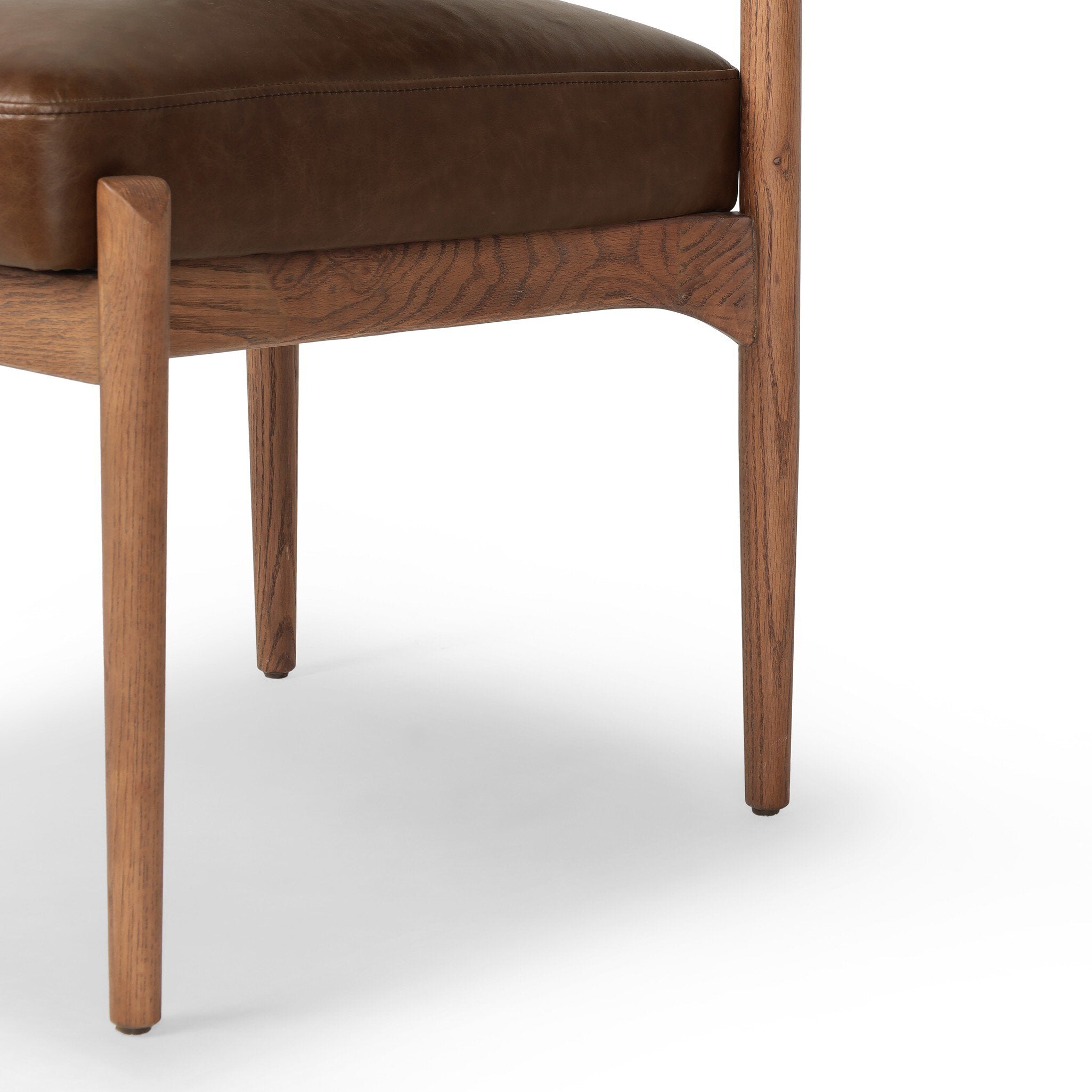 Jazelle Armless Dining Chair Shearling Bolster Back and Oak Wood Frame with Brown Leather Seating Design Idea Retro Mid Century Modern Angle View Legs