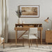Armless dining chair with light camel upholstered seat and back, wooden legs in room setting.