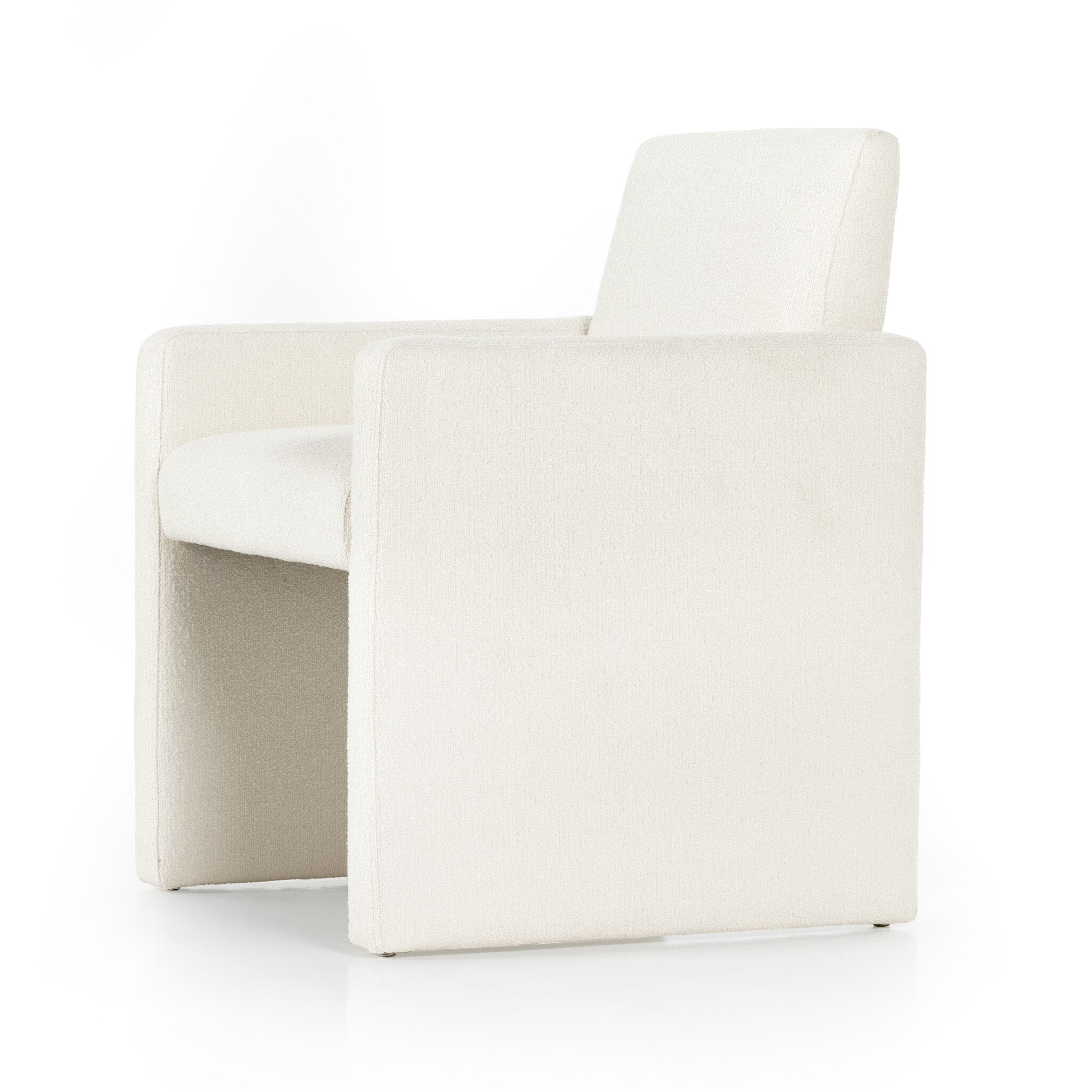 Plush Kima Dining Chair Angled View Contemporary Modern Upholstered White Chair with Detailed Fabric on White Background for Hospitality