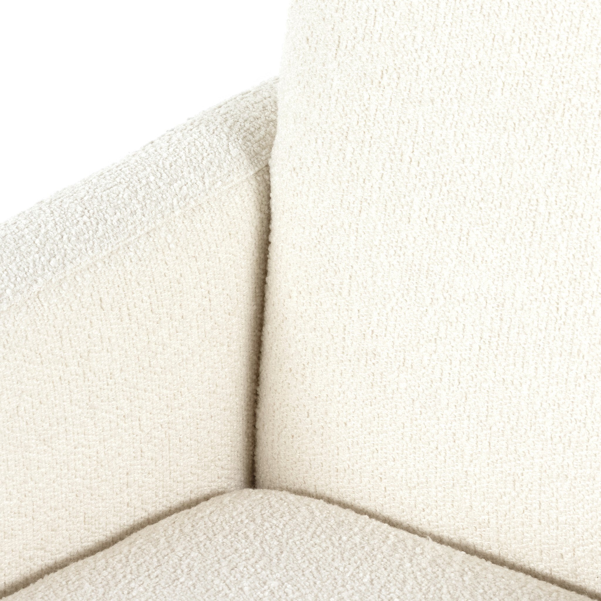 Close-up of a textured beige and white sofa corner on a white background