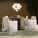 Kima Dining Armchair Contemporary Modern Upholstered White Chair in luxury hospitality room with wooden table and beige chairs under a modern chandelier