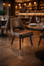 Lifestyle Image Oxford Club Chair by Social Design Supply Co: A classic hospitality lounge chair with supportive cushioning and soft upholstery for restaurants