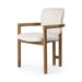 Madeira three-legged dining chair featuring a tubular frame and a curved barrel backrest in cream upholstery