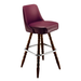 Rouge bar stool with padded seat, decorative turned wood legs, and chrome footrest