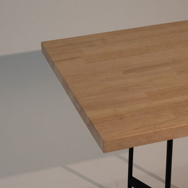 Modern whitewash butcher block table top in a coastal-inspired café with contract-grade wood construction