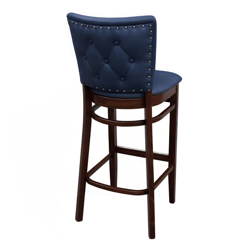 Navy Blue Dame Quincy Bar Stool with a tufted upholstered backrest, padded seat, and dark wood frame with a built-in footrest