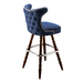 Navy blue Prescott Cowboy bar stool featuring classic button tufting and a 90-degree auto-return wood swivel base with performance upholstery