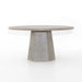 Outdoor Dining Table with a round white concrete top and tapered pedestal base