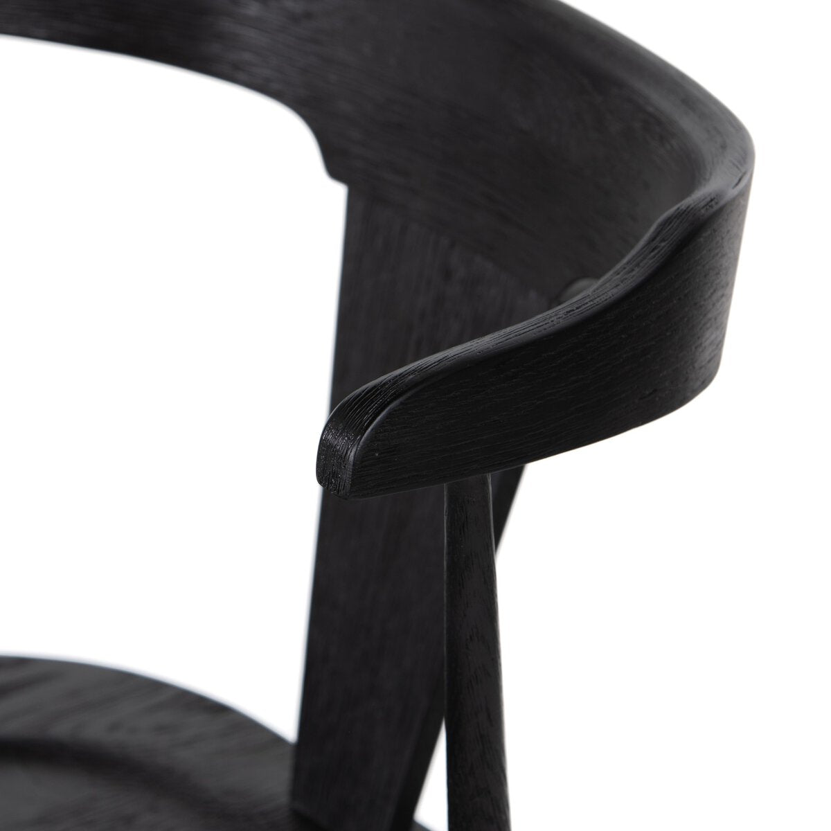 Black oak counter stool backrest and side panel detail, dark woodgrain finish