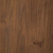 Close-up of a wooden surface with a rich brown color and visible grain.