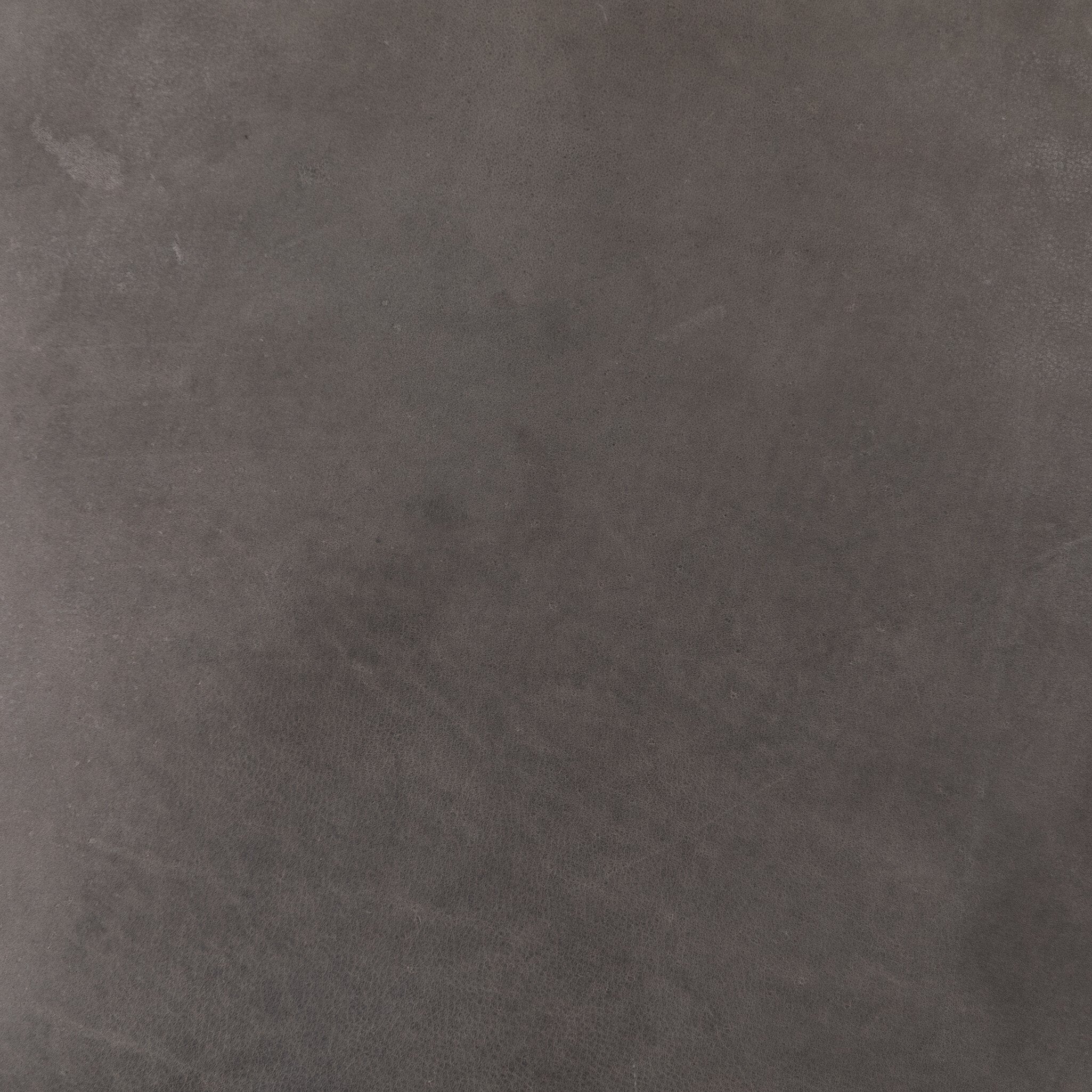 Performance fabric color swatch of Monza sleek gray dining chair with a scooped backrest and tapered legs, upholstered in top-grain leather.