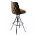 Porcini Brown Adler Bar Stool with a curved upholstered backrest and seat, featuring a sleek four-leg chrome frame and footrest
