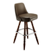 Brown leather bar stool with padded seat; decorative turned wood legs and chrome footrest