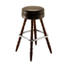 Brown upholstered bar stool with round seat, chrome footrest, turned wooden legs