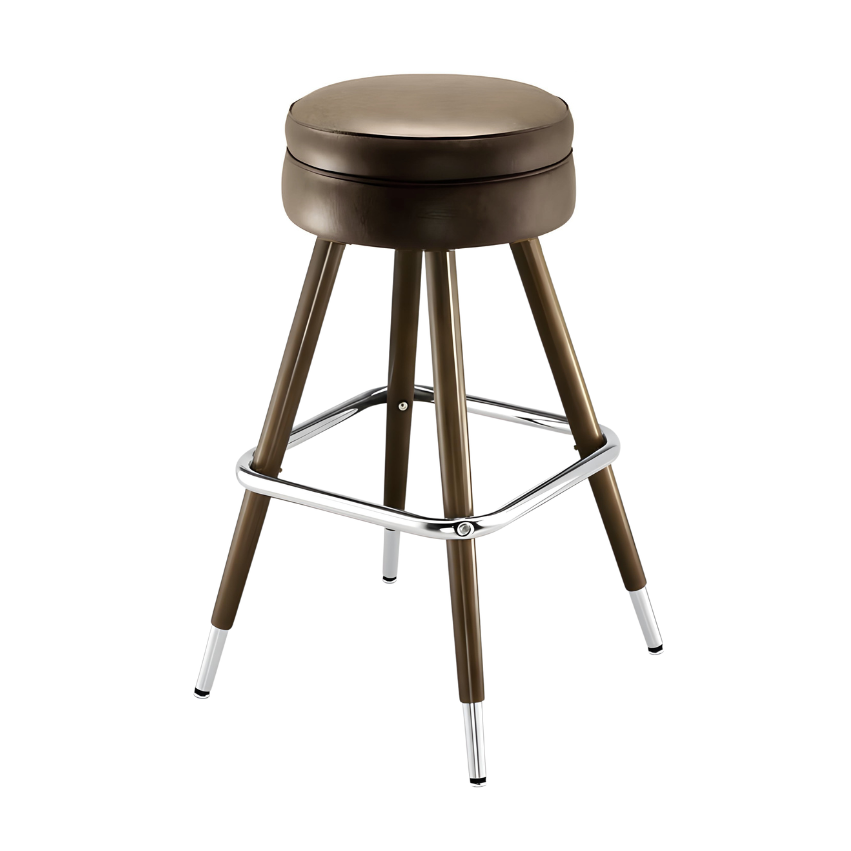 Tan upholstered bar stool with round padded seat, chrome footrest, brass legs