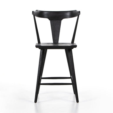 Ripley Stool in Midnight Black with tapered oak legs and a sleek monochromatic silhouette