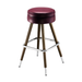 Rouge upholstered bar stool with brass-toned legs and chrome footrest