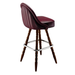 Rouge Maroon Marque Signature bar stool featuring a sweeping curved backrest and a refined upholstered seat with a sturdy wood frame