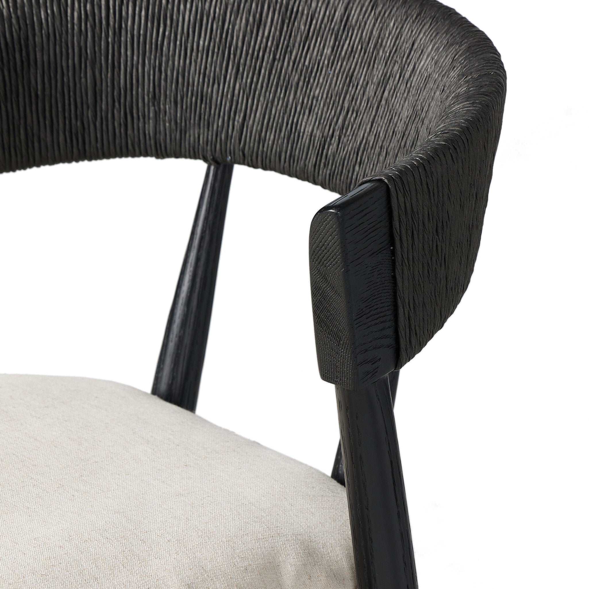 Bar stool close-up of black upholstered back corner and frame