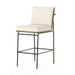 Bar stool with light seat cushion, black metal frame and side backrest knob