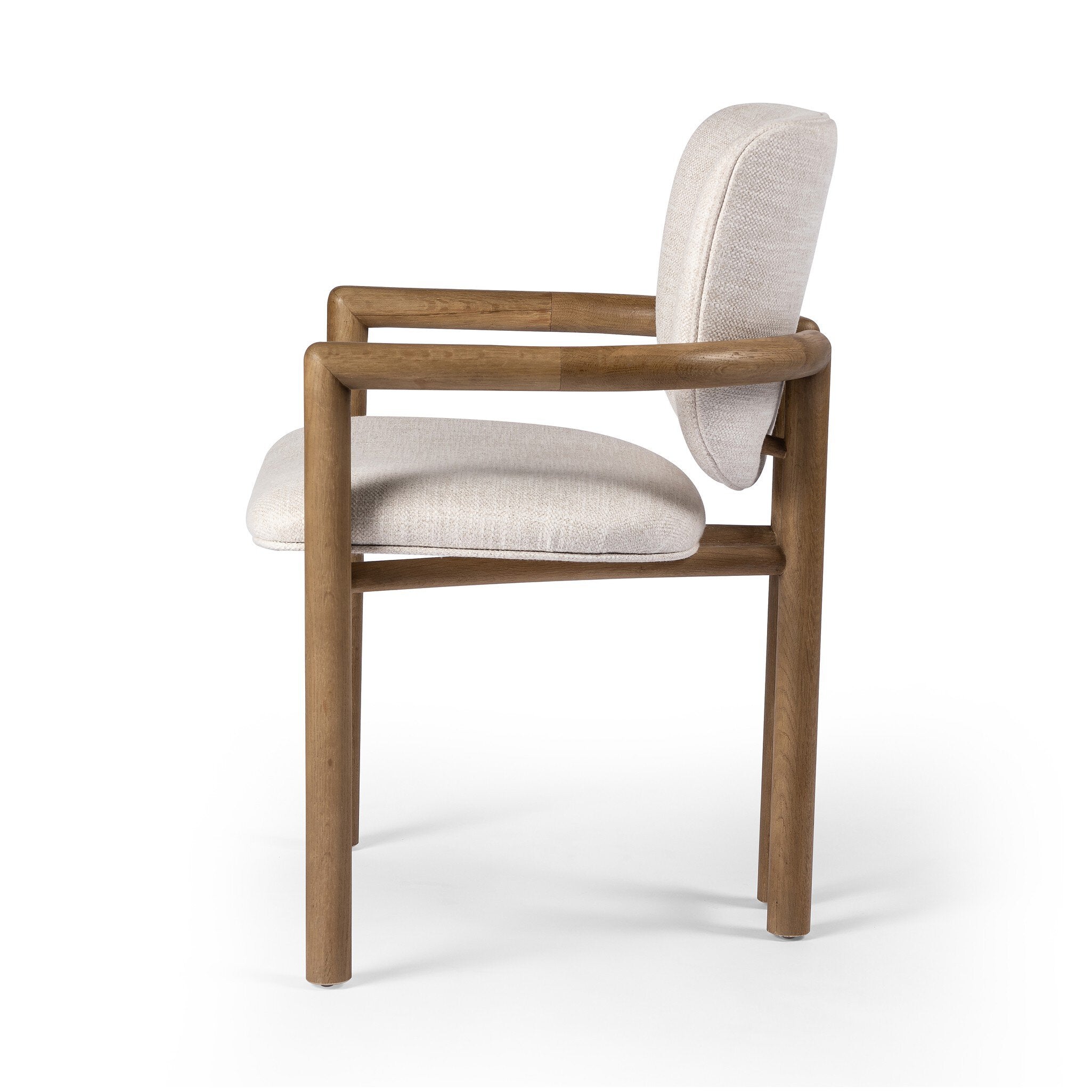Side Madeira three-legged dining chair featuring a tubular frame and a curved barrel backrest in cream upholstery