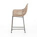Side Modern low-armed outdoor dining chair with white wicker weaving and a bronze industrial frame for hospitality