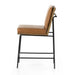 Counter stool with tan leather-look upholstery, tall back, and black metal side frame