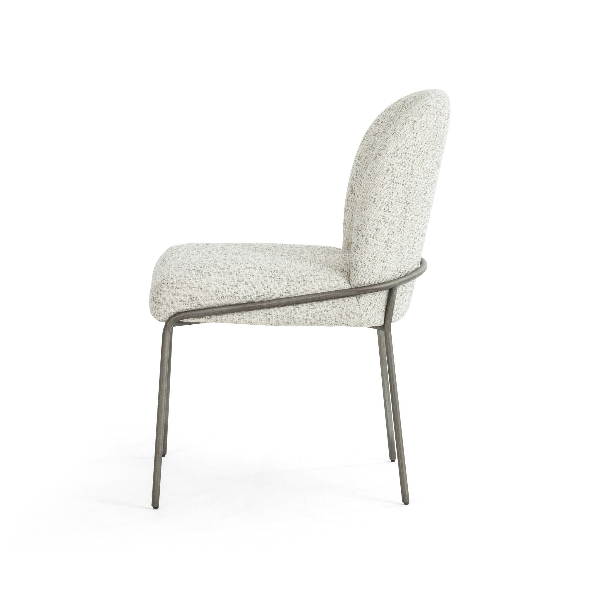 Modern chair with gray fabric and metal legs on a white background. Side chair Astrud Dining Chair in Lyon Pewter with scalloped back and brushed slate iron frame