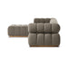 Alessi Fawn outdoor sectional with curved corner arm, padded seat cushions, and wooden base