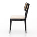 Side view Britt Dining Chair in Cambric Ivory performance fabric with black parawood tapered legs