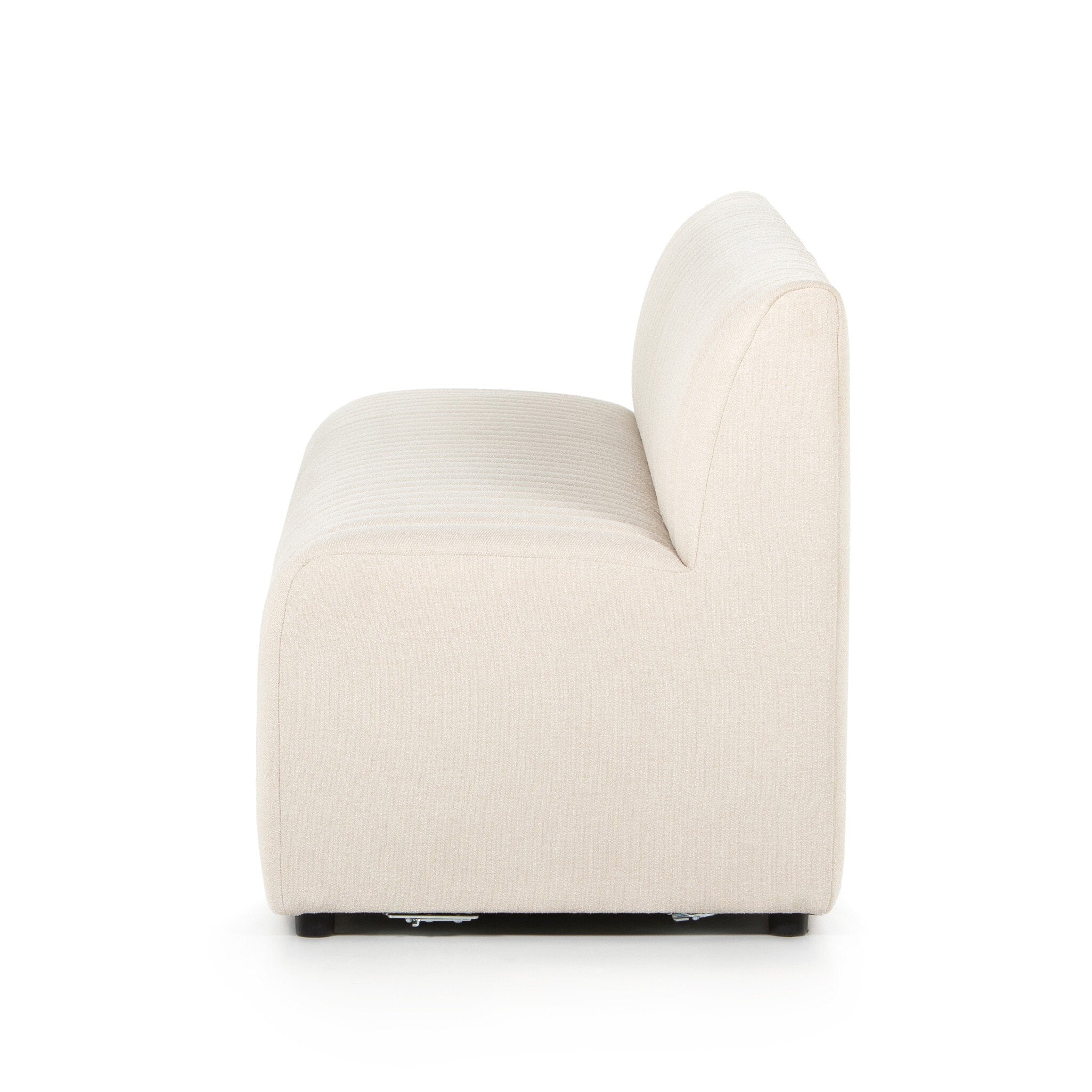 Side view Custom Augustine dining banquette in neutral performance fabric with high-back tufted detailing and wood base.